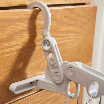 🧳 Köp 1 få 1 Gratis! 👔 Hopfällbar klädhängare – praktisk för resor, små utrymmen & smart förvaring – perfekt för hotell och hemmet 🏠
